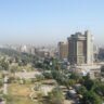 Baghdad skyline representing US and Saudi strikes on Iran-backed militias in Iraq