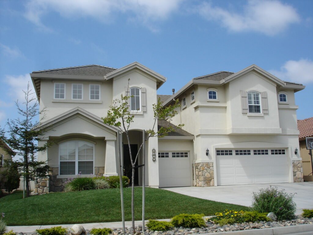 Suburban house exterior representing residential mortgage rates