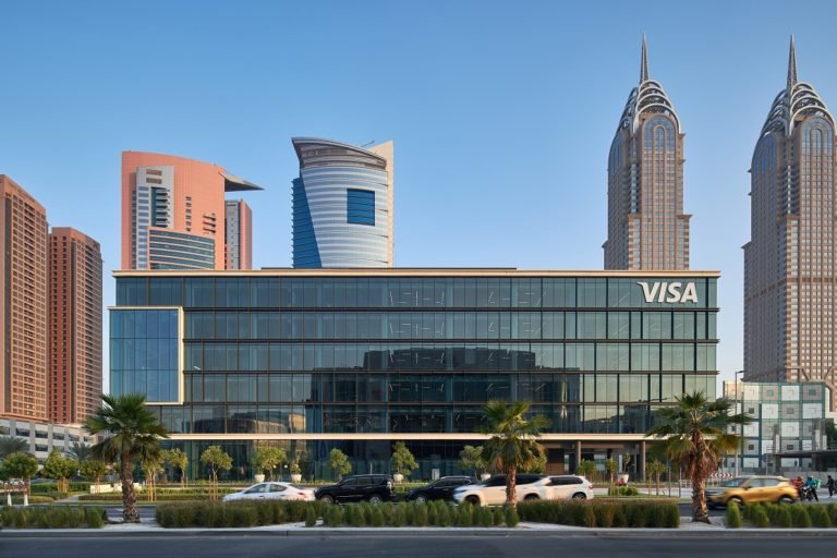 Visa headquarters and corporate signage, representing the payments company's 2026 workforce reduction as it restructures around AI